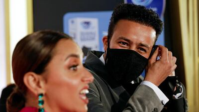 Egyptian actor Ahmed Dawood wears a protective face mask beside his wife, actress Ola Roshdy during the opening ceremony of the 42nd Cairo International Film Festival. Reuters
