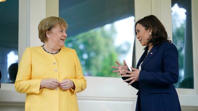 Kamala Harris greets German Chancellor Angela Merkel as she arrives at the vice president's residence, the Naval Observatory, on July 15th, 2021. AP