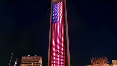 Adnoc's headquarters in Abu Dhabi is illuminated in US flag's colours to mark the country's Independence Day.