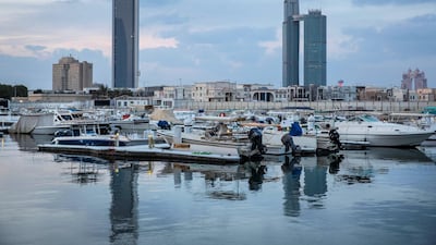 Abu Dhabi is lowering the cost of doing business as part of economic diversification efforts. Antonie Robertson/The National