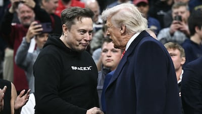 US President Donald Trump and Tesla Motors chief executive Elon Musk at the Wells Fargo Center. AFP
