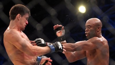 The UFC first came to Abu Dhabi on April 10, 2010, when many came out to see Brazil's Anderson Silva, right, who was not at his best in battling compatriot Demian Maia. Silva won the fight but later apologised to fans for not putting on a better show. Karim Sahib / AFP