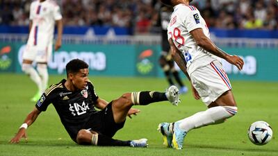 Ajaccio's French midfielder Yanis Cimignani fights for the ball with Lyon's French midfielder Corentin Tolisso. AFP