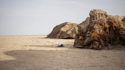 Prayers next to a salt canyon, near Dallol