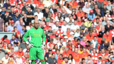 Liverpool's Pepe Reina is a man alone after Arsenal's win at Anfield. Peter Powell/EPA