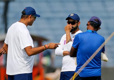 Virat Kohli and coach Ravi Shastri. Associated Press