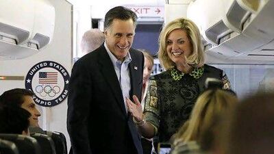 Republican presidential candidate and former Massachusetts Gov. Mitt Romney and his wife Ann board his charter plane for a visit to Israel.