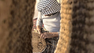 Mohammed, Saudi Arabia: This photo was taken in the eastern Saudi town of Al Awamiah, where Mohammed takes a trip to the local souq to meet a man crafting saddles out of palm strings before displaying it to the local market’s visitors.