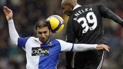 Chelsea's Nicolas Anelka goes up for an aerial challenge with Blackburn's Zurab Khizanishvili.