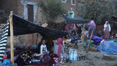 People camp on the roadside after the deadly earthquake in Imgdal, Morocco. Reuters