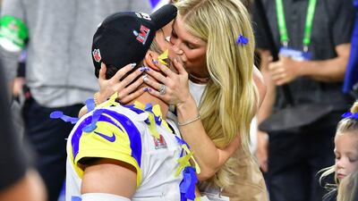 Los Angeles Rams' quarterback Matthew Stafford kisses wife Kelly Hall after winning Super Bowl LVI between the Los Angeles Rams and the Cincinnati Ben. AFP