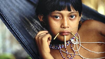 A young boy from the Yanomami tribe, who live in the rainforest in Brazil and Venezuela. Courtesy: Sam Valadi / Flickr