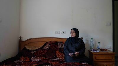 Umm Naim has been stuck in the West Bank since October 7, having travelled from Gaza for surgery for her fourth child. While there, she heard that her three other children were killed by an airstrike. From a series by Samar Hazboun.