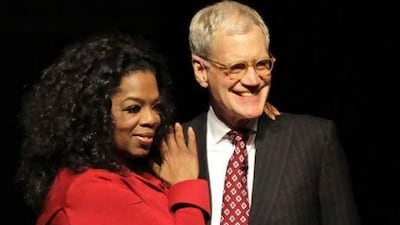 Oprah Winfrey and David Letterman. Michael Conroy / AP Photo