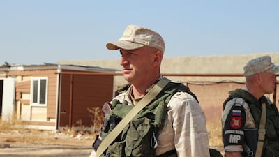 Members of the Russian military police patrol in the the northeastern Syrian city of Kobane. AFP