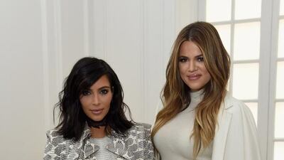 Kim Kardashian West and Khloe Kardashian. Jamie McCarthy / WireImage / Getty Images