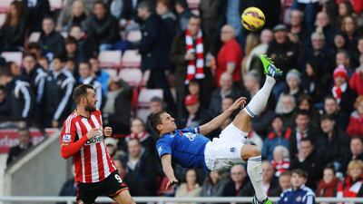 Phil Jagielka of Everton makes a spectacular clearance from Steven Fletcher of Sunderland during their teams' 1-1 draw in the Premier League on Sunday at the Stadium of Light in Sunderland. Gareth Copley / Getty Images