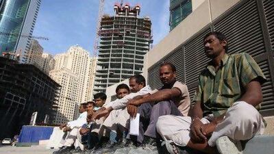 Many Indians working abroad would like to return to the subcontinent, but have no employment to return to. Dan Kitwood / Getty Images