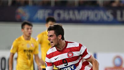 Tomi Juric of Western Sydney Wanderers celebrates scoring a goal during the Asian Champions League quarter-final against Guangzhou Evergrande in China. Zhong Zhi / Getty Images