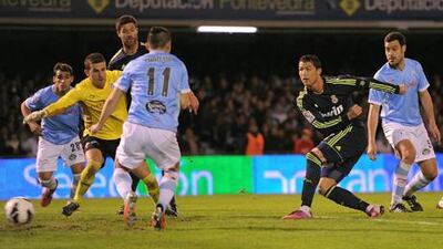 Real Madrid's Cristiano Ronaldo scores against Celta Vigo.