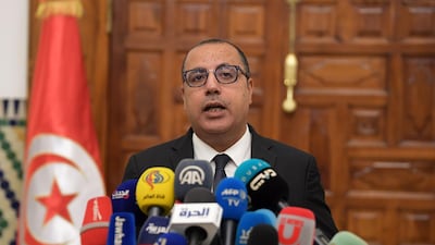 Tunisia's Prime Minister-designate Hichem Mechichi announces to the press his new government during a press conference in Carthage, on August 24, 2020. Tunisia's prime minister-designate on Tuesday unveiled the country's second government in six months, which must now seek approval from lawmakers incensed by how the administration was formed. / AFP / Fethi Belaid