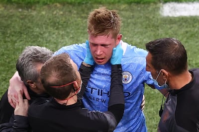Manchester City midfielder Kevin De Bruyne receives treatment on his facial injuries during the Champions League final defeat against Chelsea. AFP
