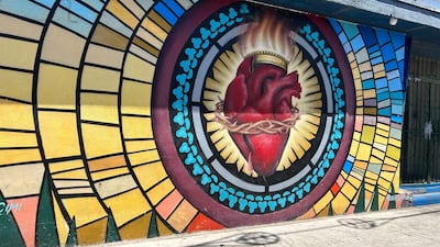 A mural outside the Sacred Heart Church in El Paso, Texas, where dozens of migrants are seeking shelter. All photos: Jihan Abdalla / The National