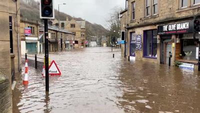 A flooded street is seen after Storm Ciara downpour in Hebden Bridge, West Yorkshire, Britain. REUTERS