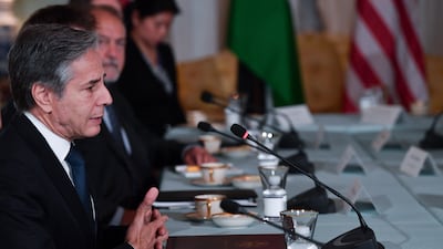 Secretary of State Antony Blinken, left, speaks during a meeting with Jordanian King Abdullah II at the State Department in Washington.
