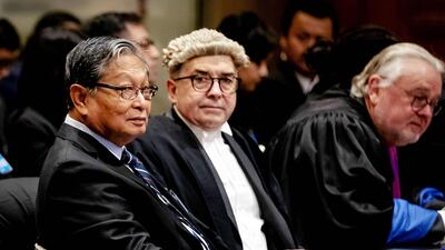 Kyaw Tint Swe, Union Minister of Myanmar (L) looks on during the ruling of the International Court of Justice in The Hague in the lawsuit filed by The Gambia against Myanmar in which Myanmar is accused of genocide against Rohingya Muslims. AFP/Robin VAN LONKHUIJSEN