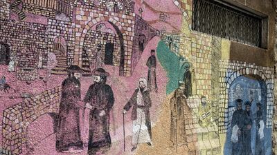 Biblical paintings are seen on the outside of buildings of the Beit Romano Jewish settlement in Hebron. A new Israeli archaeological site is tightening the noose around suffering Hebron Palestinians. All Photos by Heidi Levine for The National