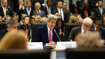 Speaking at the OSCE ministerial council meeting in Belgrade, US secretary of state John Kerry urged the world to come together behind a peace strategy recently hashed out by the United States, Russia and other countries. Jonathan Ernst, Pool Photo via AP
