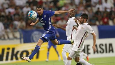Al Nasr, in blue, could find no way past El Jaish at Al Maktoum Stadium in Dubai. Ashraf Al Amra / Aletihad