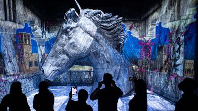 In the Passions and Values gallery, visitors are surrounded by grey sandstone, which rises into a 5.5-metre, 52-tonne sculpture of the neck and head of Dubai Millennium, Sheikh Mohammed’s favourite racehorse.