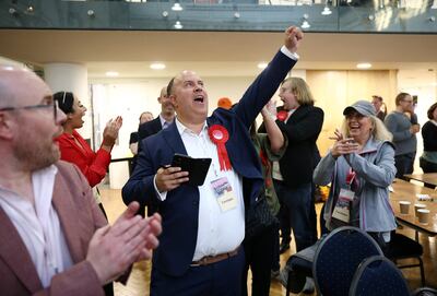 Labour's Adam Hug celebrates after the his party gained leadership of Westminster City Council in UK local elections. Reuters