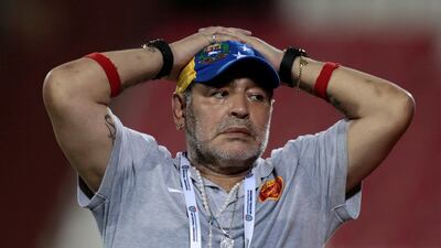 Diego Maradona looks dejected after his Fujairah side were held to a 1-1 draw by Khorffakan to deny them automatic promotion to the Arabian Gulf League. Christopher Pike / Reuters