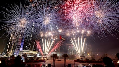 Fireworks light up the skies near Emirates Palace on last New Year's Eve in Abu Dhabi. Sammy Dallal / The National