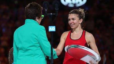 Simona Halep, right, has now lost in three grand slam singles finals. Clive Brunskill / Getty Images