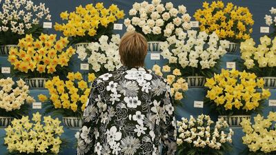 LONDON - MAY 22: A visitor to the Chelsea Flower wears a floral patterned jacket on May 22, 2006 in London. The yearly flower show will be visited by HM Queen Elizabeth II today and opens to the public tomorrow. (Photo by Peter Macdiarmid/Getty Images)