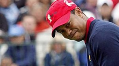 Tiger Woods sinks the winning putt at Harding Park.