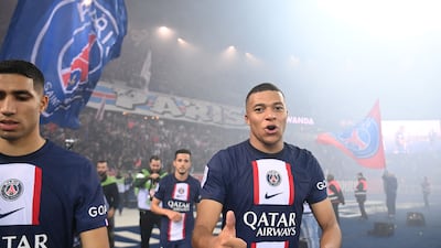 Paris Saint-Germain's French forward Kylian Mbappe gives a thumbs up at the end of the match. AFP
