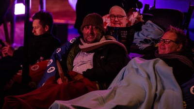 People wrapped up in blankets as temperatures in Melbourne dipped.