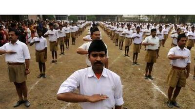Members of the Rashtriya Swayamsevak Sangh National Volunteers Organisation take part in a drill in Siliguri, India.