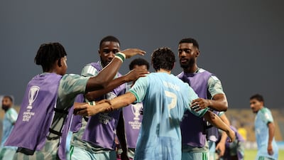 Al Ahli's Francisco Trincao celebrates with teammates after scoring at Zabeel Stadium. Chris Whiteoak / The National