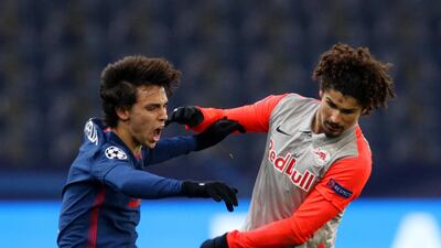 Atletico's Joao Felix is challenged by Andre Ramalho of Salzburg. Getty