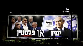 An election billboard featuring an image of Israeli Prime Minister Benjamin Netanyahu reading 'It's either the Right or Palestine' in Haifa, Israel. EPA