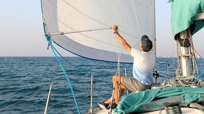 Devrim Anadol takes part in the Dubai Offshore Sailing Club pursuit race. Chris Whiteoak / The National