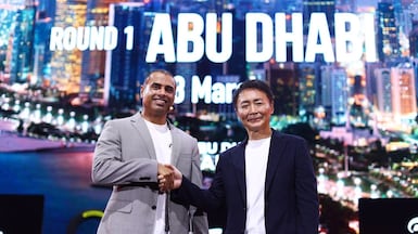 Saeed Al Fazari, executive director of strategic affairs at the Department of Culture and Tourism – Abu Dhabi, and Kazunori Yamauchi, producer of the Gran Turismo series, announced the upcoming event at a tournament in Japan. Photo: AD Gaming