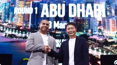 Saeed Al Fazari, executive director of strategic affairs at the Department of Culture and Tourism – Abu Dhabi, and Kazunori Yamauchi, producer of the Gran Turismo series, announced the upcoming event at a tournament in Japan. Photo: AD Gaming