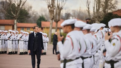 Mr Macron inspects troops in Varces. Reuters